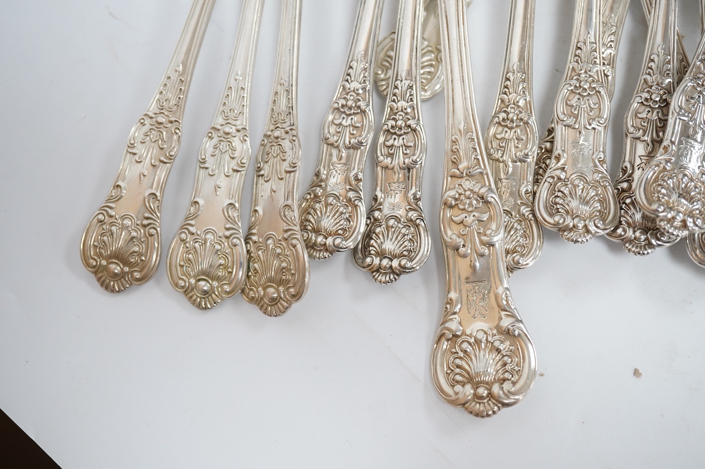 Eleven early Victorian silver Queens pattern dessert forks, by Joseph & Albert Savory, London, 1838, together with a set of four similar table spoons, William Eaton, London, 1838 and two later silver King's pattern table